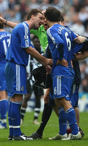 NEWCASTLE, UNITED KINGDOM - MAY 05: John Terry urges team mate Ricardo Carvalho of Chelsea to stay on the pitch during the Barclays Premier League match between Newcastle United and Chelsea at St James' Park on May 5, 2008 in Newcastle, England. (Photo by Clive Rose/Getty Images)