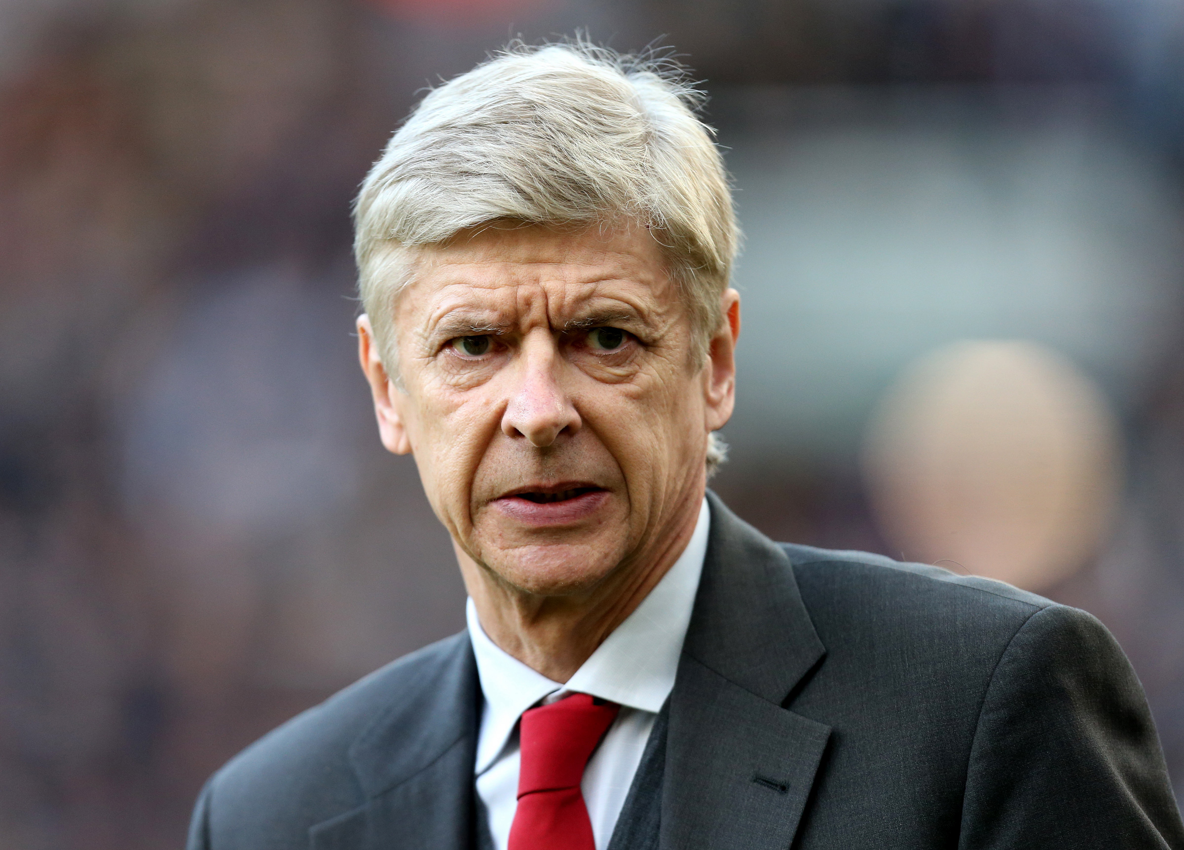 Arsenal's manager Arsene Wenger looks on ahead of their English Premier League soccer match against Newcastle United at St James' Park, Newcastle, England, Sunday, Dec. 29, 2013. (AP Photo/Scott Heppell)