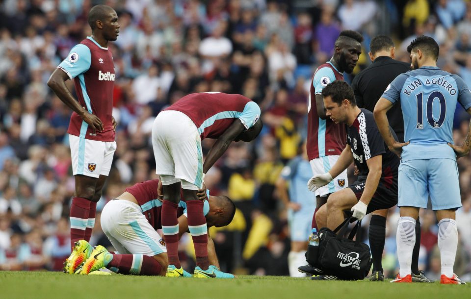 Winston Reid in pain from the impact